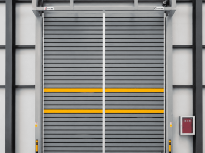 Extra wide rigid high speed door installed for industrial building entrance